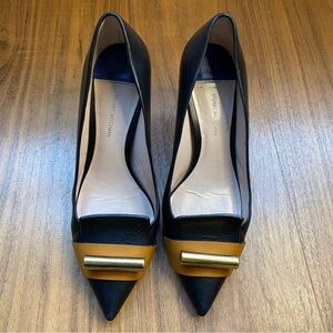 Stuart Weitzman Black Leather Heels 7M Pointed Toe Gold Bar Accent Pumps